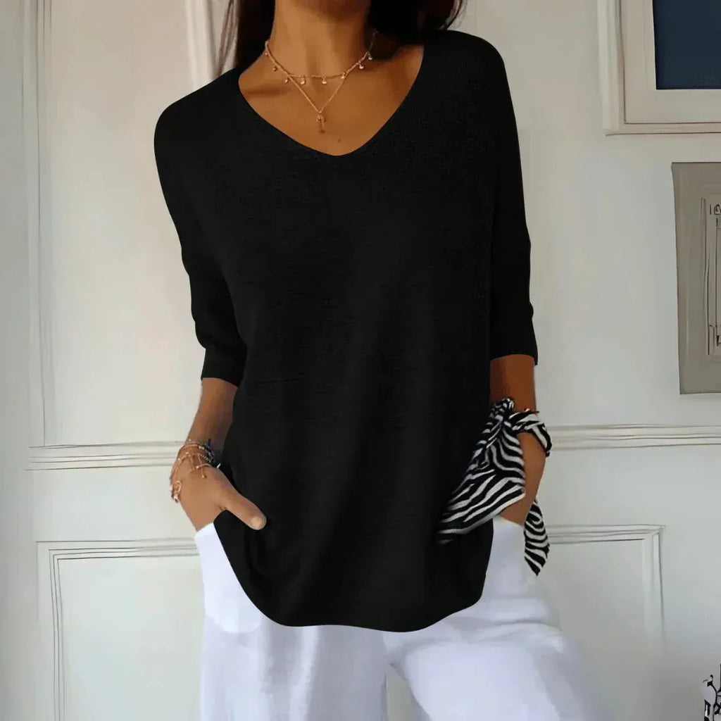 Women's V-Neck Three-Quarter Sleeve Knit Shirt with Dropped Shoulders for Casual Wear