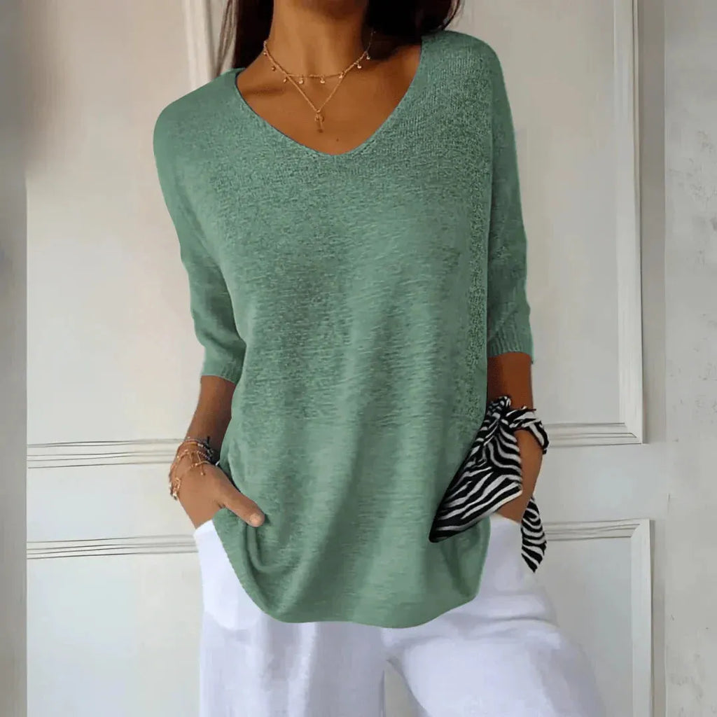 Women's V-Neck Three-Quarter Sleeve Knit Shirt with Dropped Shoulders for Casual Wear