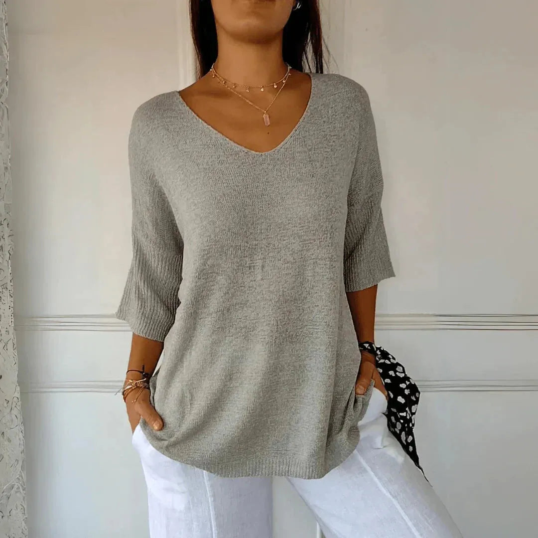 Women's V-Neck Three-Quarter Sleeve Knit Shirt with Dropped Shoulders for Casual Wear